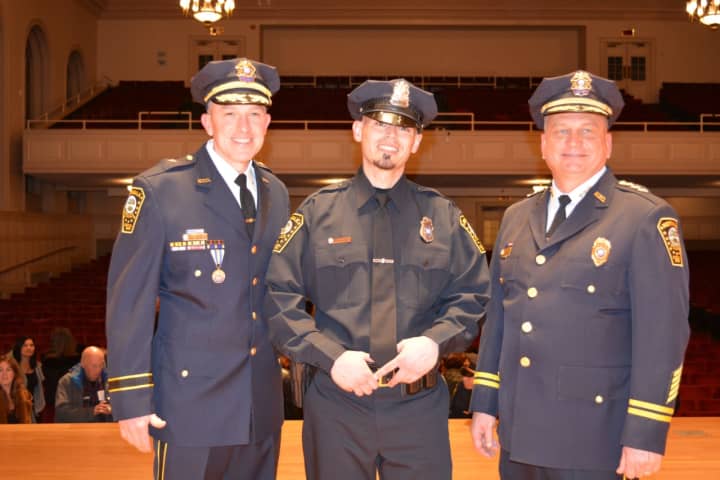 Deputy Chief James Walsh, Officer Julio Rodriguez and Chief Thomas Kulhawik