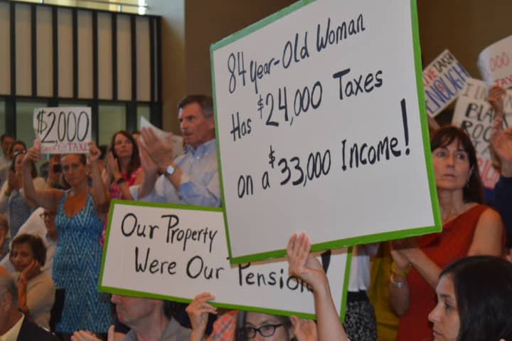 About 300 people stormed City Hall to speak their minds about the 2016-17 property tax hike in Bridgeport.