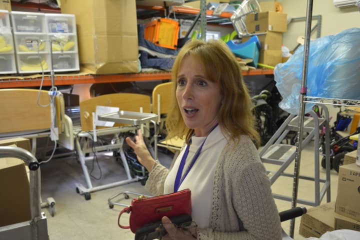 Linda Mosiello, director at Sunshine Children&#x27;s Home &amp; Rehab Center in New Castle, gives a tour of a storage space on the grounds. A need for more space is cited as a reason for a proposed expansion.