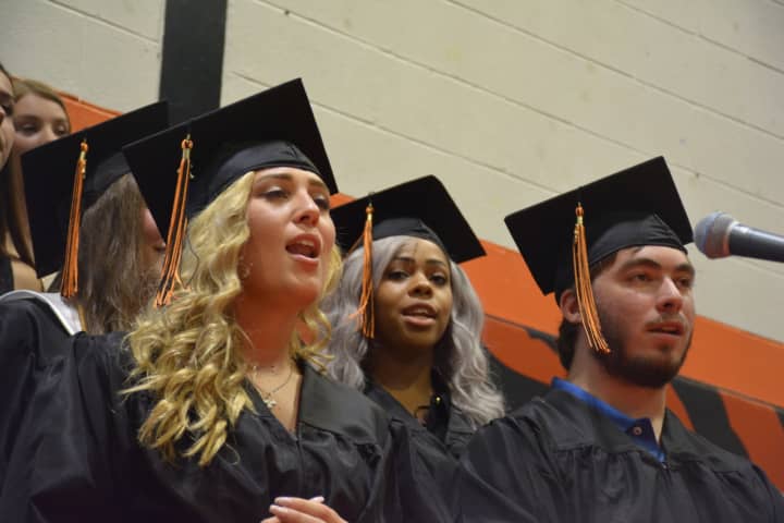 Members of Pawling High School&#x27;s Class of 2016 sing a rendition of Paul Simon&#x27;s &quot;Bridge Over Troubled Water&quot; at their commencement.