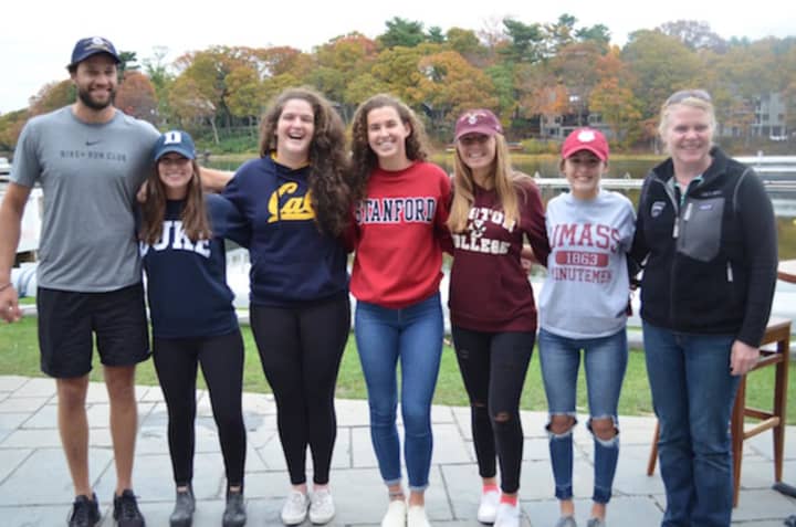 Gordon Getsinger, SRC junior girls head coach; Eden Schumer; Sydney Kend; Kelsey McGinley; Brooke Schwab; Natalie DiLeo; and Sharon Kriz, SRC director of rowing and junior boys head coach. See story for rowers&#x27; hometowns and their college choices.