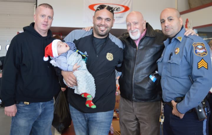 From left: Fairview Police Capt. Dave Brennan, Palisades Park Police Officer Michael DeBartolo -- with Michael Jr. -- Dominic &quot;Uncle Junior&quot; Chianese, Norwood Sgt. Paul Capu.