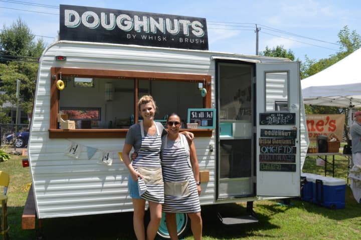 Becca Bryan and Betsy Arroyo outside their labor of love, Dixie Doughnuts by Whisk + Brush, at the Black Rock Farmers Market.