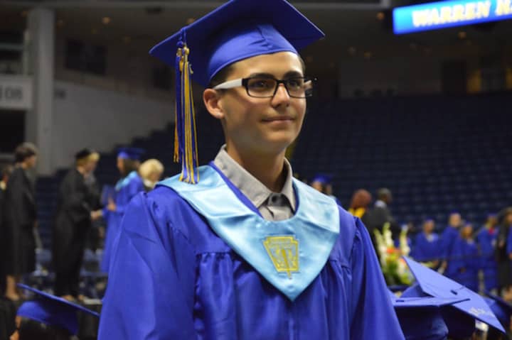 A proud graduate of Warren Harding High School at the graduation on Tuesday at the Webster Bank Arena.