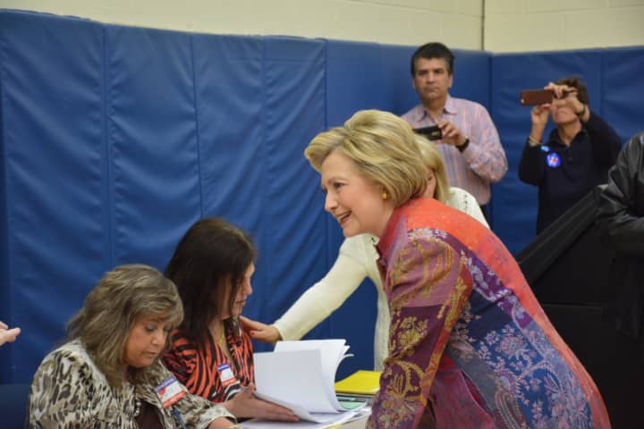 Hillary Clinton checks in to her polling place at Chappaqua&#x27;s Douglas G. Grafflin Elementary School in order to vote Tuesday in New York&#x27;s Democratic presidential primary.