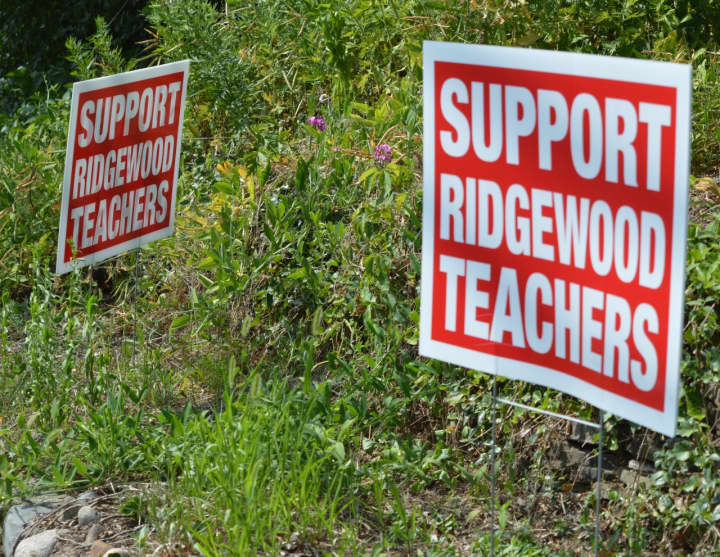 Signs in support of Ridgewood teachers are still being displayed on lawns throughout the village. Their contract expired in June 2015.