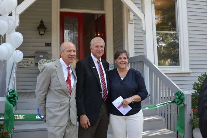 Bill Purcell of the Greater Valley Chamber of Commerce, Shelton Mayor Mark Lauretti and Allison Wysota, founder of Adam&#x27;s House, opened the Coram Avenue site Thursday.