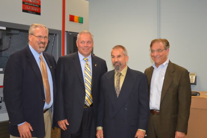 From left, Scott Wilderman, founder of Bridgeport Re-Entry Collaborative ; Corrections Commissioner Scott Semple; student Mark Newton; and Joe Carbone, president of The WorkPlace