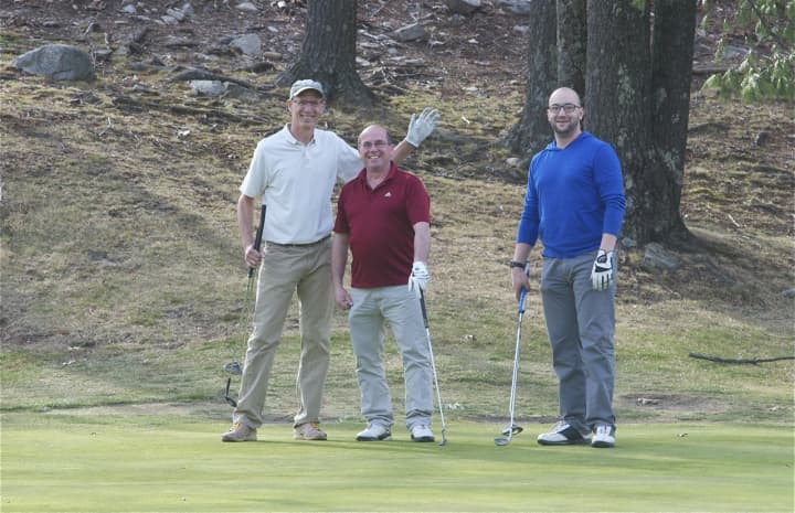 Area residents hit the links at Norwalk&#x27;s Oak Hill Golf Course to enjoy the spring weather.