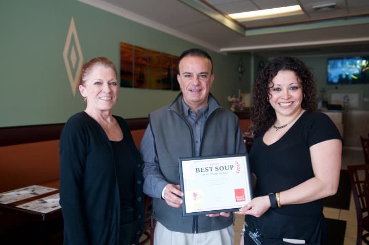 Daily Voice Director of Media Initiatives/Managing Editor Managing Editor Joe Lombardi (center) delivers first-place plaque to Marian Feliciotto (L) and owner Carina Evangelista.