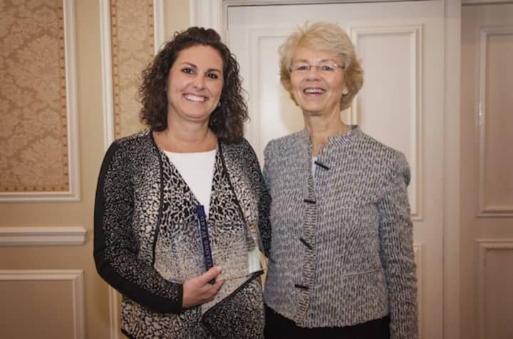 Julianne Ward (left) is presented with the Realtor of the Year award by BK Bates. Ward is part of of Berkshire Hathaway HomeServices New England Properties. The award is from Greenwich Association of Realtors.