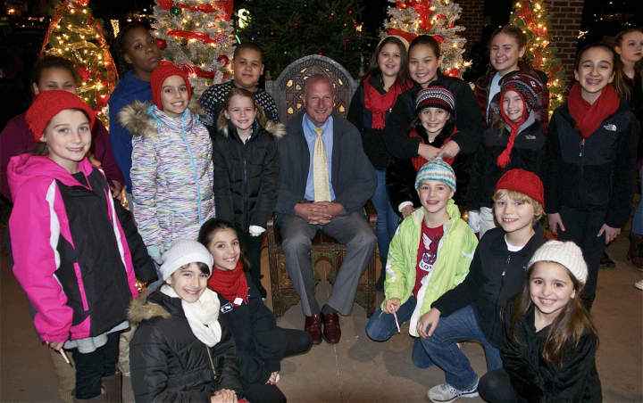Children gather around Shelton Mayor Mark Lauretti at Friday night&#x27;s tree lighting. 