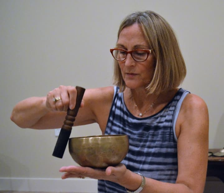 Mary Ann Gebhardt leading a yoga nidra sound healing class in Montvale.