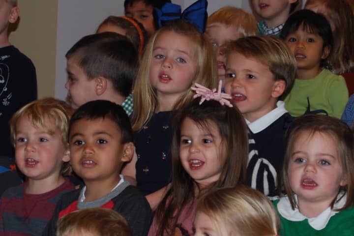 Kids singing during the &quot;Thanksgiving Sing&quot; at Methodist Family Center Preschool in Darien.