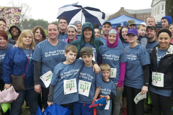 More than 2,100 runners turn out in the rain to run in the Sandy Hook 5K in Newtown on Saturday.