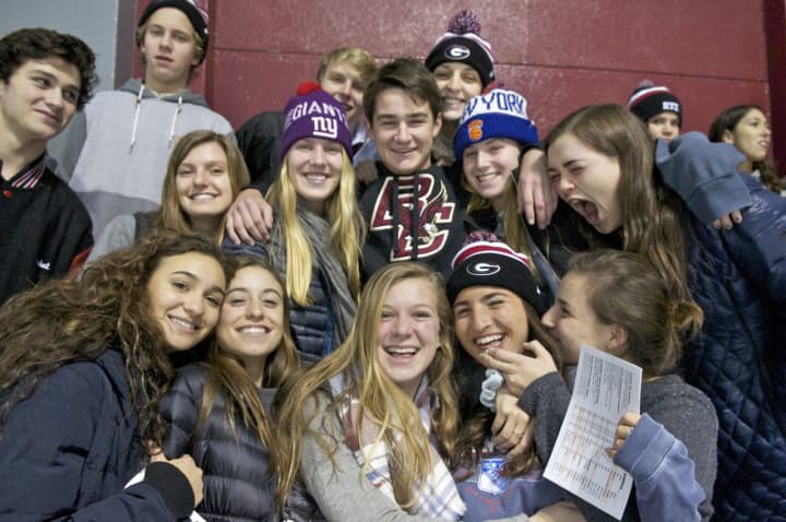 Fans enjoy the action at the Playland Ice Arena.