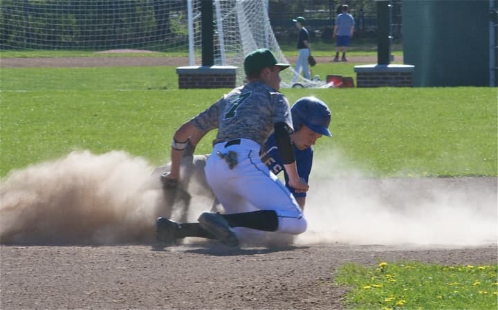 Pleasantville posted a win over Dobbs Ferry Wednesday afternoon. Pictured: a Dobbs Ferry player slides safely into second.