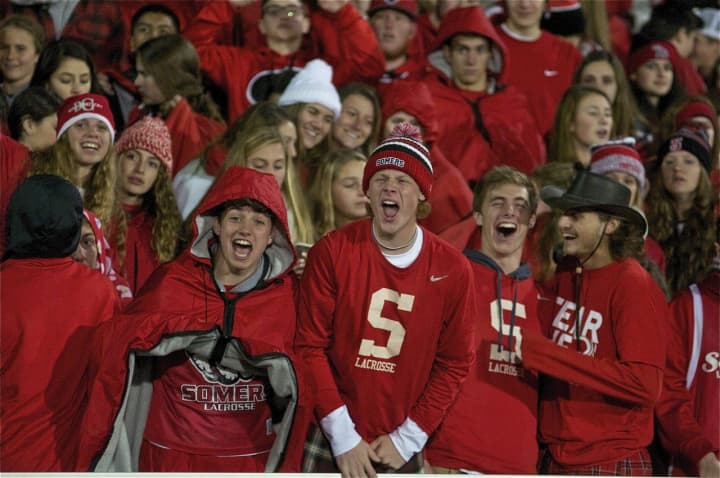 Somers 12th Man support group cheers on the Tuskers at Kingston&#x27;s Dietz Stadium.