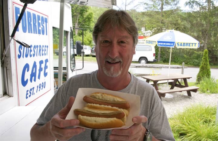 A happy customer with two dogs from Forrest&#x27;s Sidestreet Cafe on the Pawling/Patterson line.