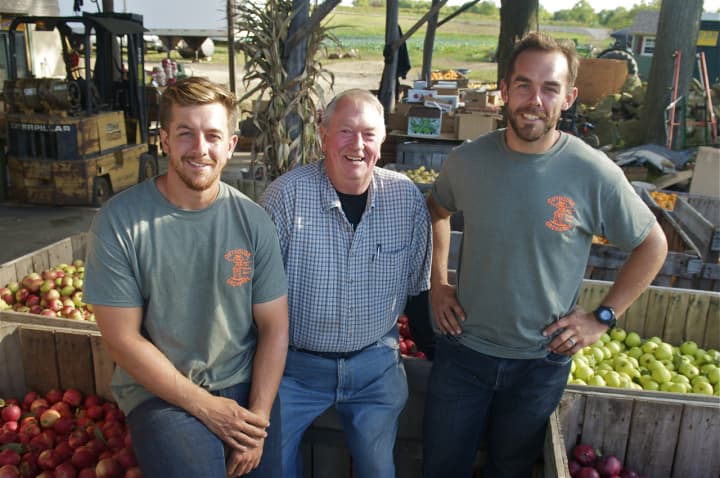 Owner Wayne Outhouse (center) is flanked by sons Jesse (left) and Andrew.