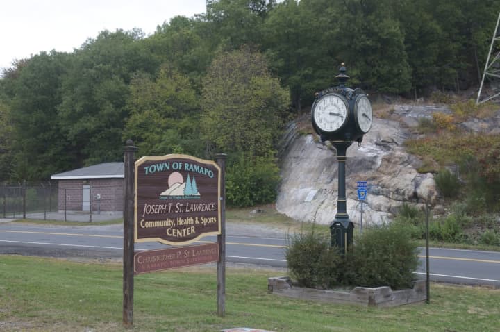 The town of Ramapo is negotiating a potential settlement in a dispute over an illegal shortcut built on town-owned property in a rapidly growing subdivision in an unincorporated area of Ramapo.