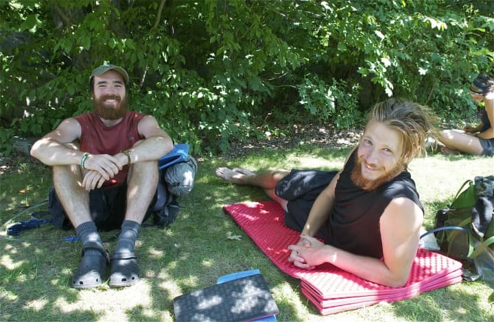 Nicknamed Songbird (L) and Foot (R) for the duration of their Adirondack Trail journey, the hikers take a break for food, drink and rest at Mountaintop Market.