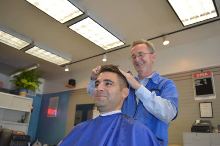 Hillsdale barber Tim Kane works on Jordan Kapp of Paramus, a guidance counselor at Pascack Valley High School. He came to get his haircut on his lunch break and said he liked the old-school barbershop feel.