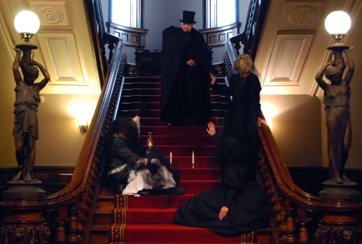 Halloween at the Lockwood-Mathews Mansion Museum with Volunteer Ghosts Paul and Hadley Veeder, Rose Carroll, and Midge Lopat.