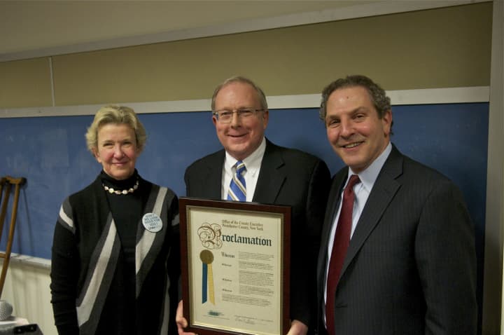 Nancy Karch (L) George Oros, Chief of Staff for County Executive Rob Astorino, and Joel Seligman hold proclamation.