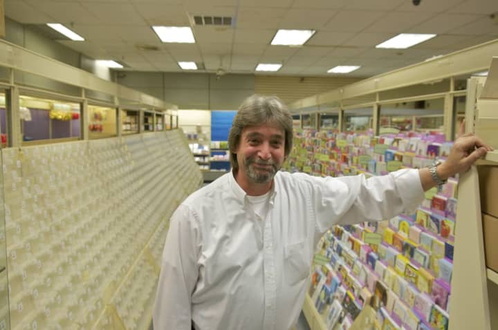 Lyn&#x27;s Cardsmart owner John isn&#x27;t smiling because his store lost its lease, he&#x27;s smiling because of the outpouring of love from area customers worried they might lose their card and gift shop.