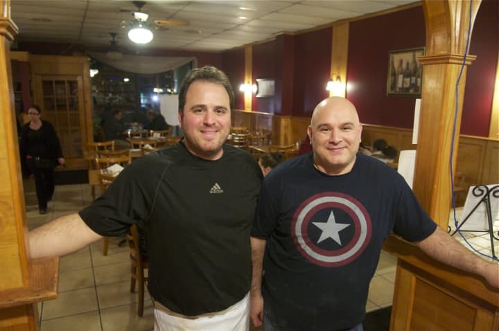 Volare owners Dino (L) and Alfredo Mazzotta (missing is brother Alex) take a break to pose for a rare photo at the Lake Carmel restaurant.