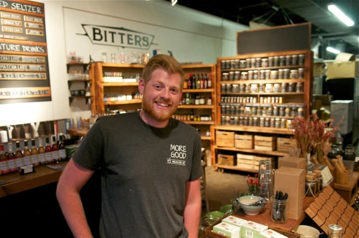 More Good&#x27;s Brett DeNicolais. The store specializes in flavoring syrups, organic loose leaf tea, herbs, spices, cocktail bitters, and bar accessories.
