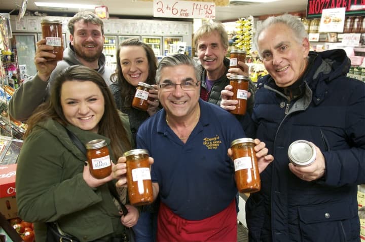 Vinny Lamorte (center) and happy customers with his new Fra Diavolo Marinara Sauce.