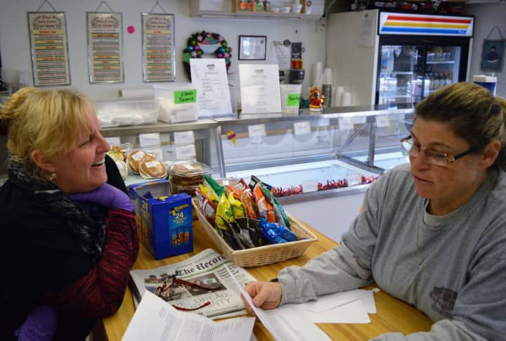 Tami Moses, right, and Theresa Brown of Clifton enjoy fan mail from kids who like to come to the Whistle Stop. They&#x27;ve been friends for 30 years.