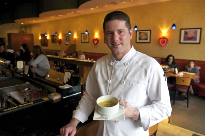 Crew Owner Thomas Kacherski with one of his housemade soups.