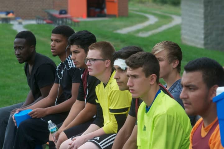 The Dover High boys soccer team preps for the upcoming season at a recent scrimmage.