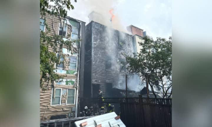 Crews arrived at the scene of the first in East Boston to find heavy smoke conditions