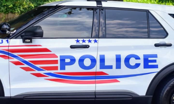 A DC Metropolitan Police officer was stabbed by a wanted woman.