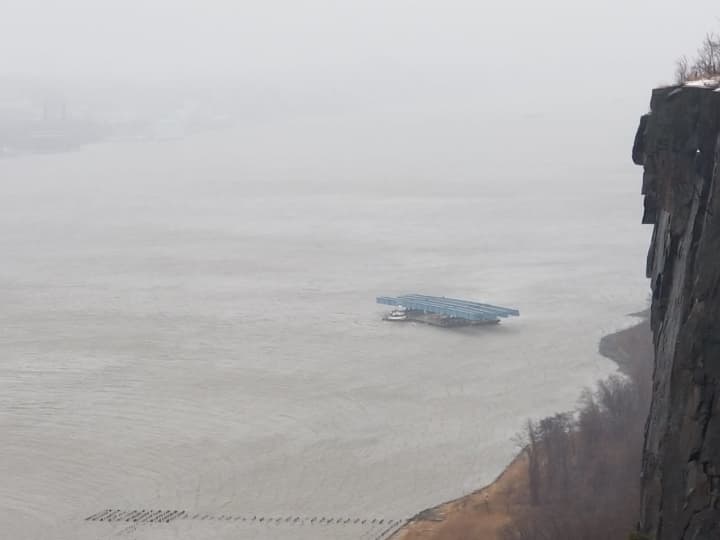 One of the multiple barges floating loose on the Hudson River on Friday.