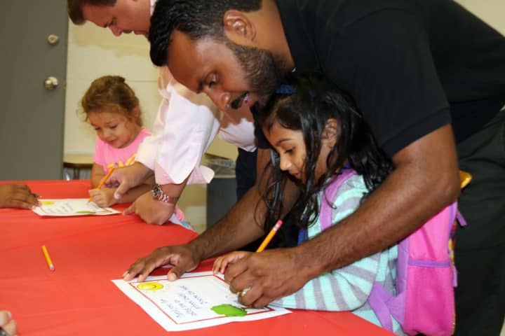 Hundreds of men took part this week in &quot;Dads Take Your Child To School Day&quot; at the Alice E. Grady Elementary School and the Carl L. Dixson Primary School in Elmsford.