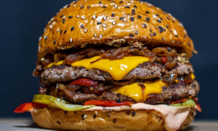 A multi-layer cheeseburger.