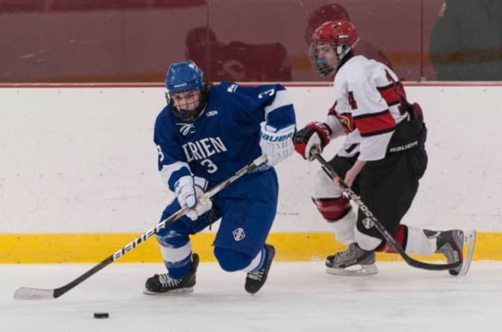 The Darien High School Blue Wave hockey team will host a fundraiser for ALS research during its home game against New Canaan on Jan. 16.
