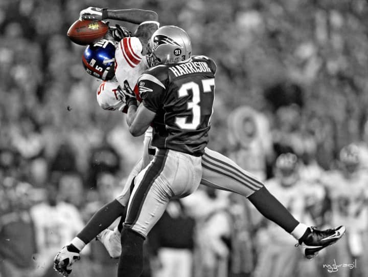 David Tyree making his famous &quot;helmet catch&quot; at Super Bowl XLII.