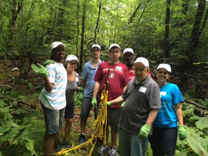 Disabled adults helped rehab trails at the Onatru Farm and Preserve this week.