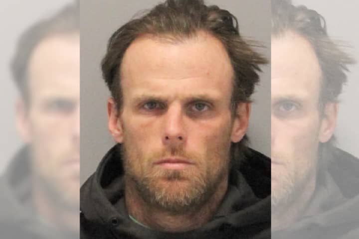 Police arrested Oceanside resident Donald Schreiner Thursday, March 30, following a phone call in which he allegedly threatened to use his assault rifle to harm a Nassau County Police officer.