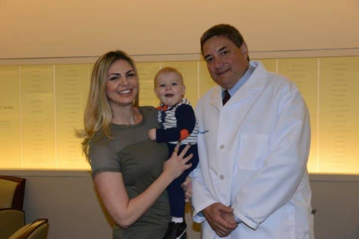 MaryBeth Stancato of New Milford holds her son, Francesco Valentino, who was born a year after she underwent a non-invasive procedure to treat her cervical fibroid. John DeMeritt, M.D.