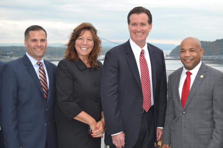 From left, Dutchess County Executive Marc Molinaro, State Sen. Sue Serino, State Senate Majority Leader John Flanagan, and State Assembly Speaker Carl Heastie take in the view from the Walkway Over the Hudson.