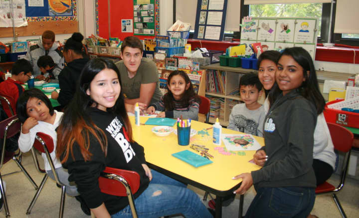 Students from Elmsford&#x27;s Alexander Hamilton Junior/Senior High School mentor younger children at the Dixson Primary School during the school district&#x27;s recent &quot;Day of Service&quot; program.