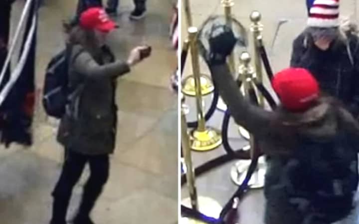 The FBI says the woman in the photos with the red hat, backpack, cellphone and tambourine is former NYPD spokeswoman Sara Carpenter of Queens.
