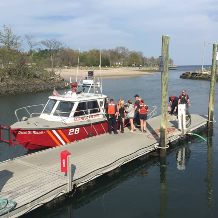 Three college students were rescued from Long Island Sound in Fairfield Monday afternoon.